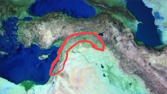 Satellite map of the Near East with the historical Syriac region outlined in red